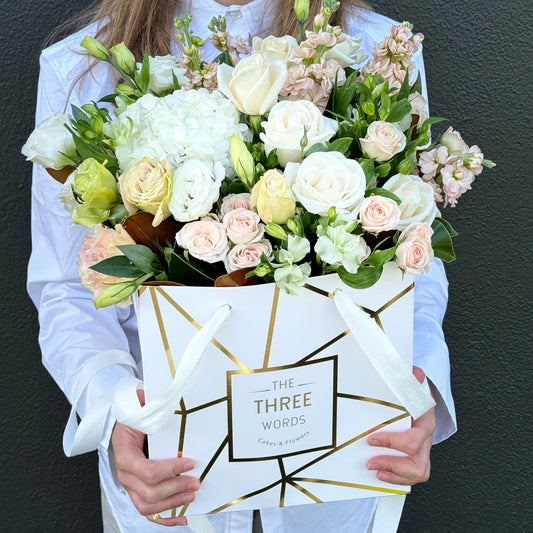 [TOMORROW] FLORISTS DESIGN FLOWERS IN LUX BAG